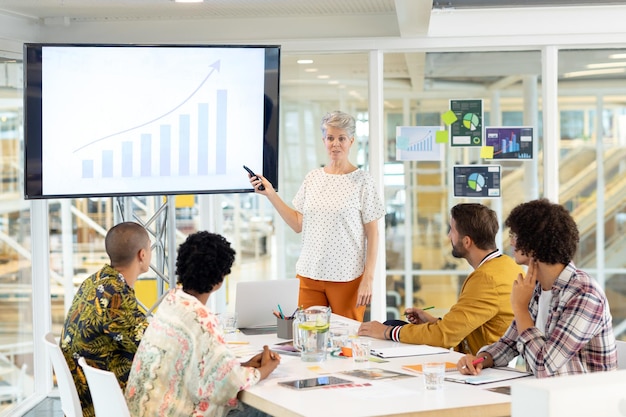 Small business accounting desk with ledger and calculator