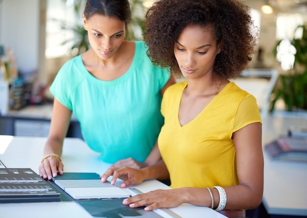 Small business bookkeeping — organised desk with ledger and accounts